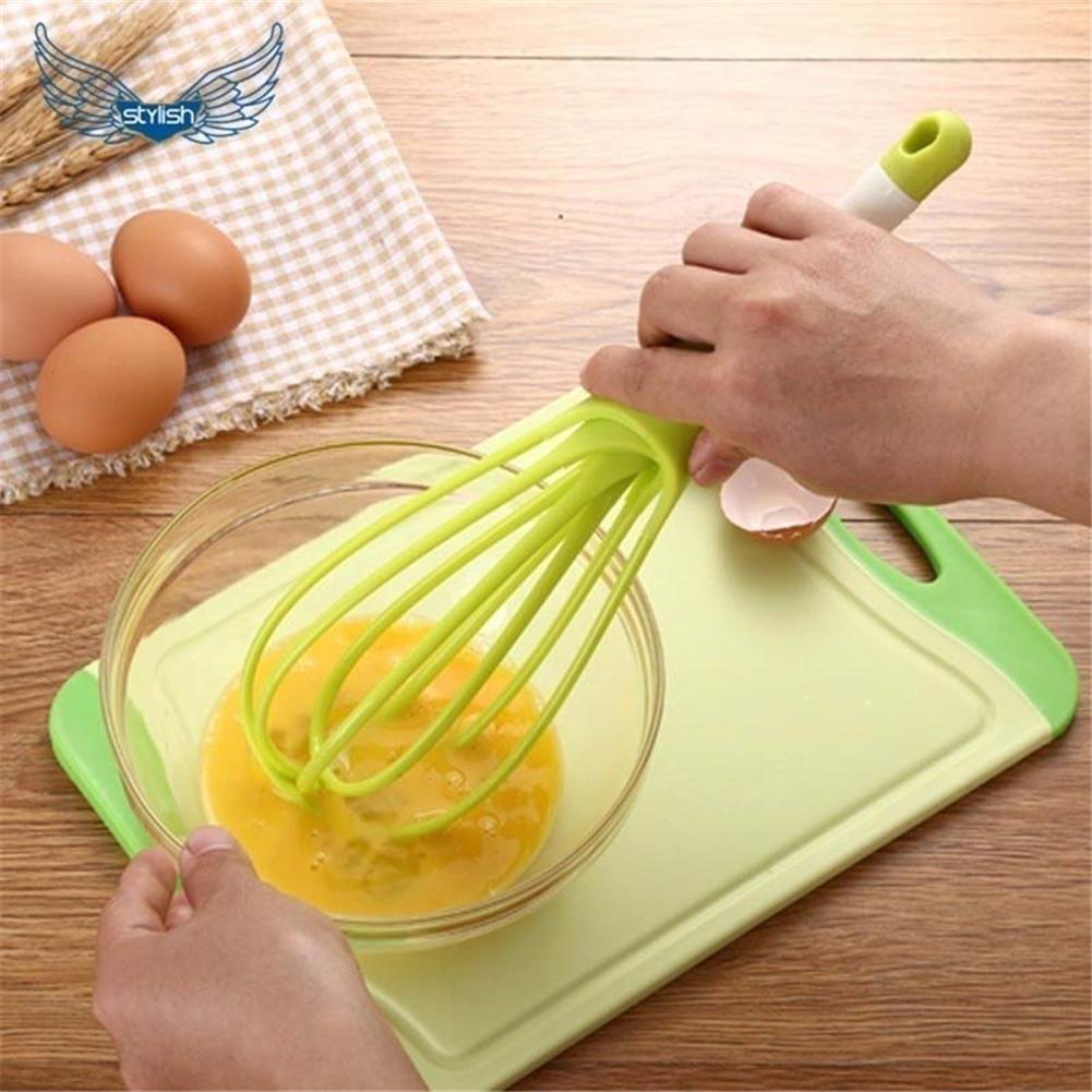 Handy plastic whisk mixer for whipping milk, coffee, eggs, and juice.