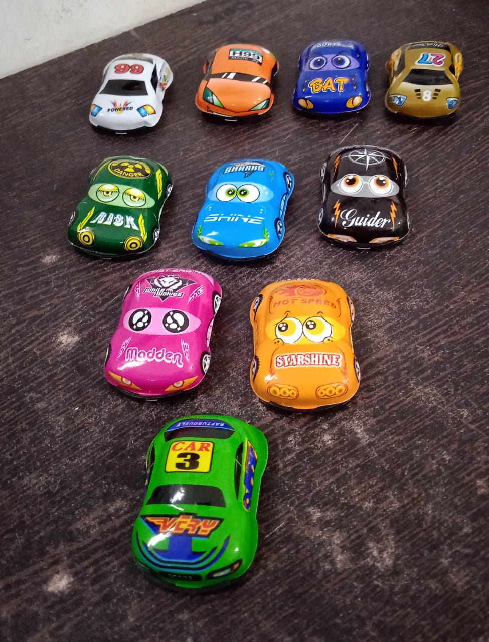 Set of mini pull back cars, ideal for kids, showing diverse car designs.